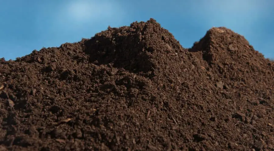 A large pile of compost that is ready to use.